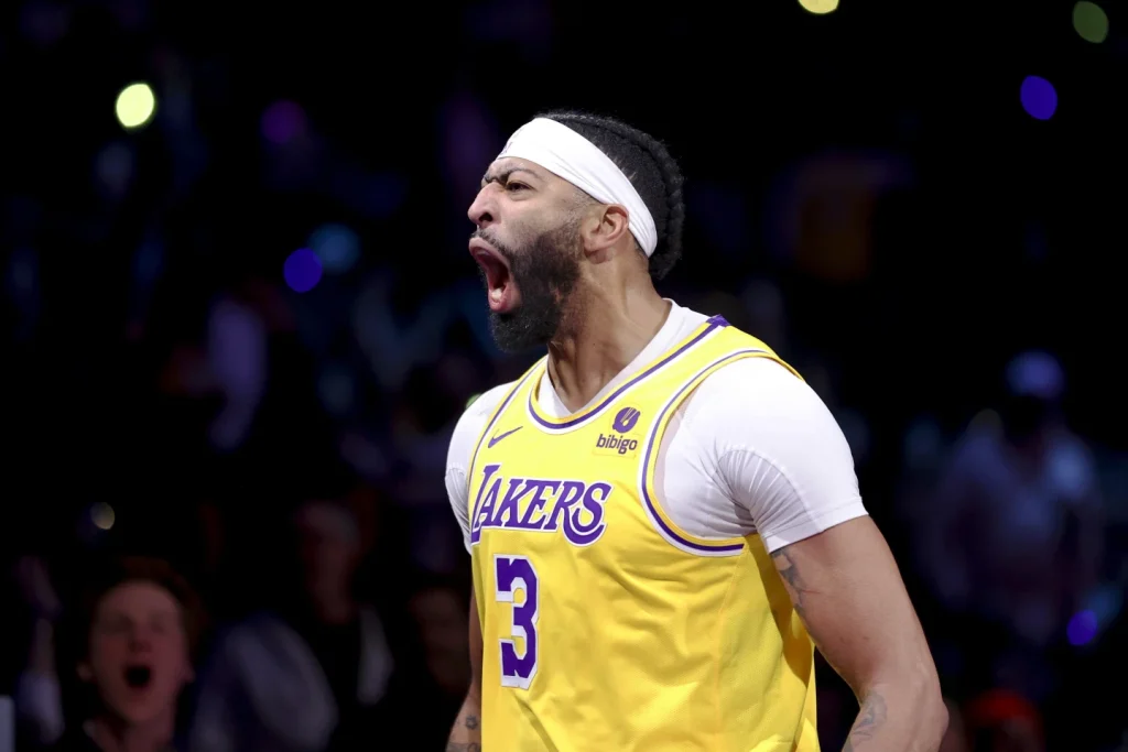 Los Angeles Lakers forward Anthony Davis (3) shouts after taking a shot against the Indiana Pacers during the second half of the NBA Basketball In-Season Championship Game, Saturday, Dec. 9, 2023, in Las Vegas.